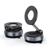 Two black magnifying lenses with adjustable rings, one shown closed and the other open and propped up, on a clean white background.