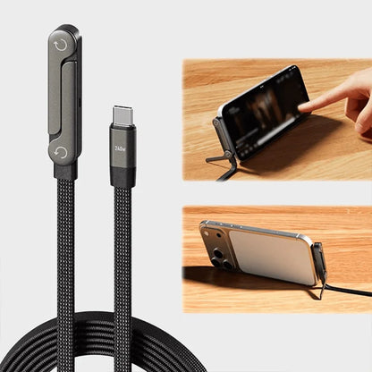 Black charging cable with phone holder on a wooden surface